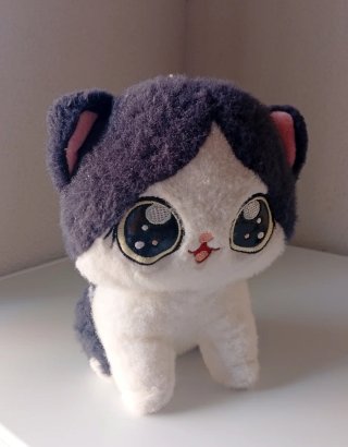 Peluche gato ojos grandes tipo anime 0w0