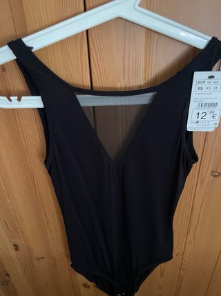 Body negro con escote de malla