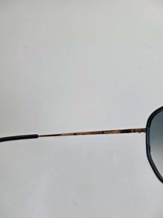 Gafas de sol Ray-Ban RB3648M Doradas.