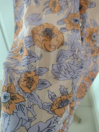 Blusa sin mangas H&M floral naranja y morada