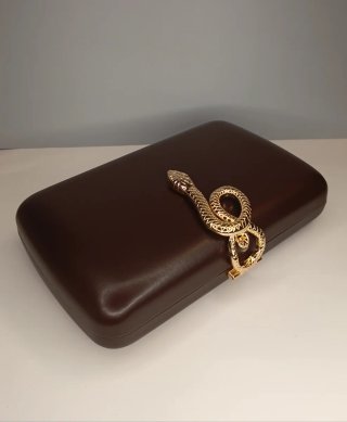 Bolso de fiesta con cierre joya serpiente dorada