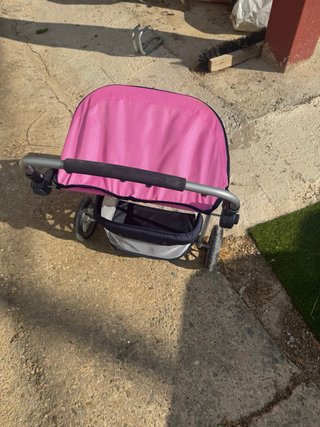 Carrito de muñecas con 2 bebés