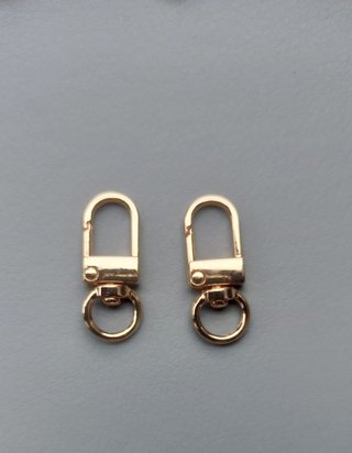 2 Ganchos Giratorios para Bolsos Color Dorado
