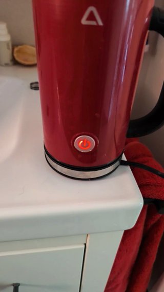 Espumador de leche rojo