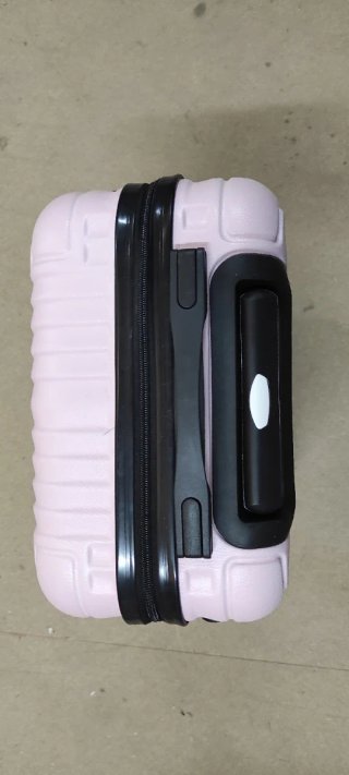 Maleta de viaje rosa con ruedas