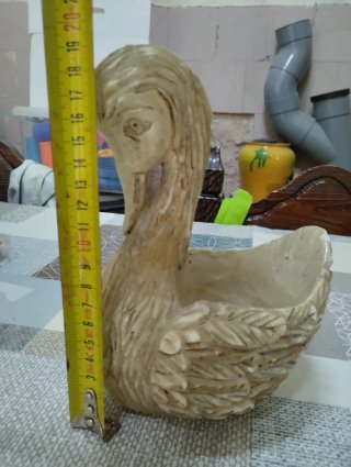 Figuras talladas: cisne, elefante y jarrón