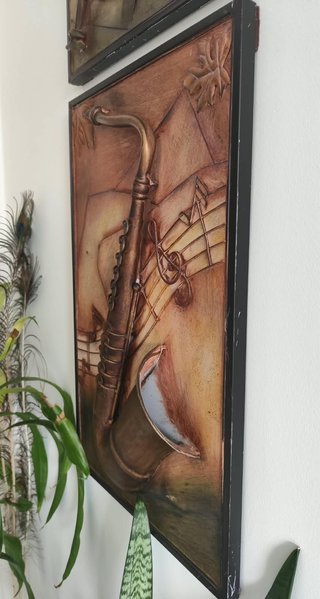 Pareja cuadros relieve musical trompeta saxo