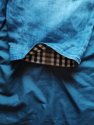 Pantalón vaquero corto desgastado
