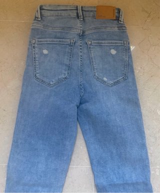 Pantalones vaqueros desgastados azules