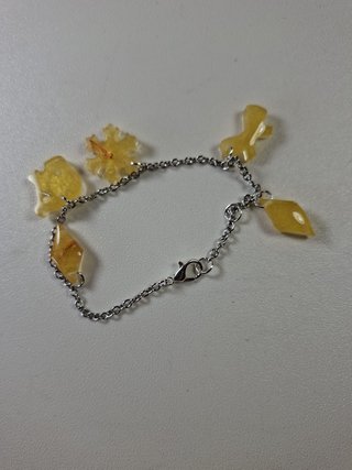 Conjunto Pulseras con dijes de resina