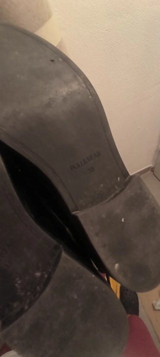 Mocasines negros con flecos y tachuelas