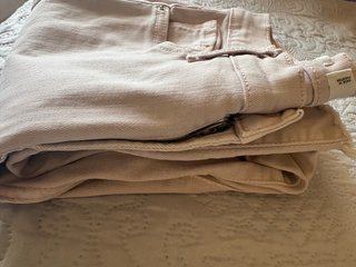 Pantalones campana rosa deshilachados
