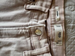 Pantalones campana rosa deshilachados