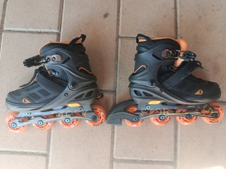 Patines Story Fusion en línea negros y naranjas