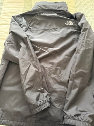 Chaqueta cortavientos The North Face gris