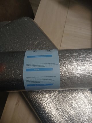 Rollos de papel pintado texturizado gris