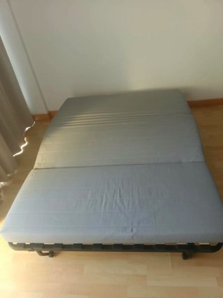 Sofá cama plegable gris y blanco