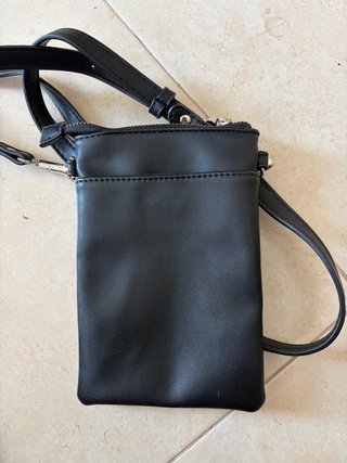 Bolso de mano negro con estrellas