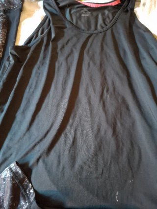 Leggings y camiseta sin mangas negra