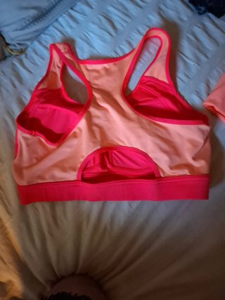 Top deportivo RUN rosa y morado