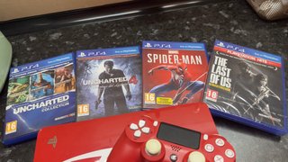 PS4 Slim 1TB Spider-Man + Mando + juegos