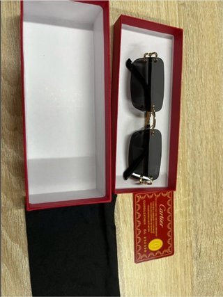 Gafas de sol Cartier Rimless Marrones y Doradas