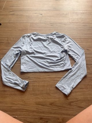 Top crop maniche lunghe azzurro