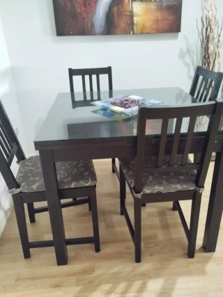 Mesa de comedor extensible de cristal y madera