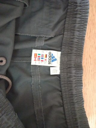 Pantalón corto deportivo Adidas gris hombre