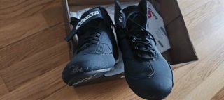 Botas de moto Alpinestars negras y amarillas