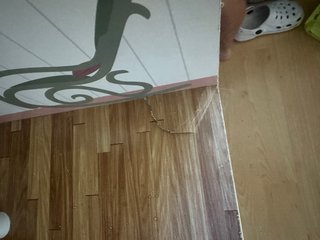 Casita de muñecas de madera