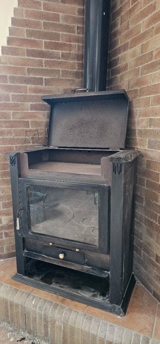 Chimenea de leña esquinera