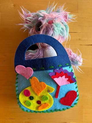 Lote juguetes: Maleta Nenuco, peluche y accesorios