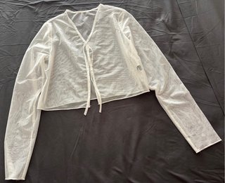 Blusa transparente blanca manga larga