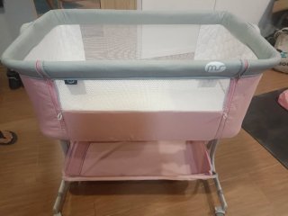 Minicuna rosa con mosquitera