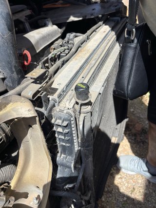Radiador Volvo S60 y otras piezas