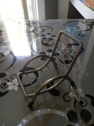 Supporto telefono in metallo