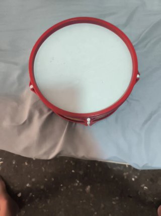Tambor infantil con baquetas