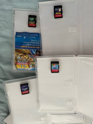 Nintendo Switch V2 + Caja + 4 Juegos + Funda