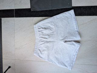 Fear of God Essentials Shorts Grises Hombre
