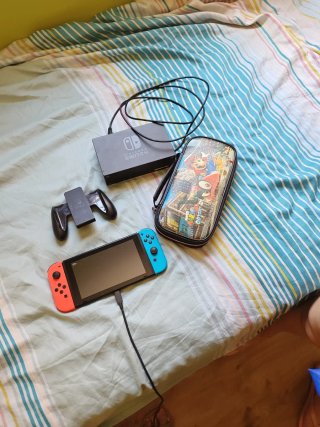 Nintendo Switch Azul/Naranja + Accesorios