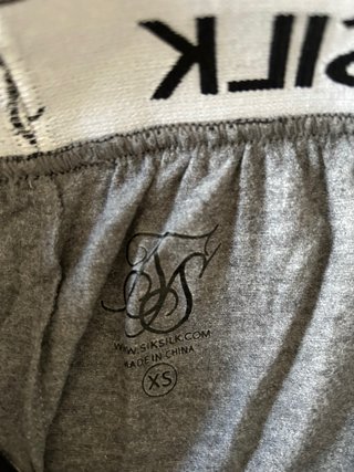 Pantalón corto SikSilk gris