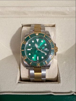 Reloj de pulsera dorado y verde Automatico