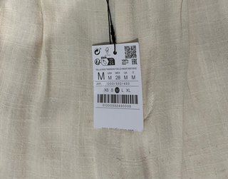 Pantalón beige ancho