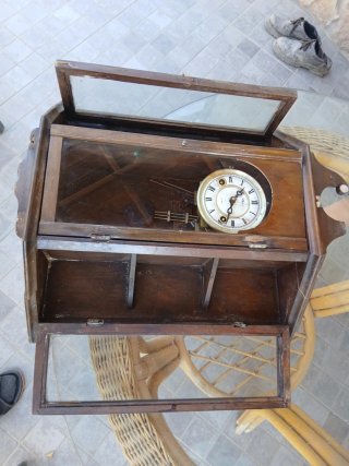 Reloj de pared antiguo madera y cristal