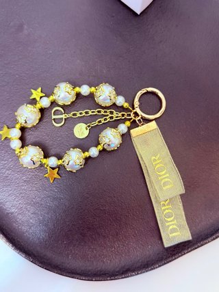 Llavero Dior Perlas y Estrellas Doradas