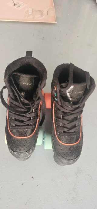 Patines negros 4 ruedas