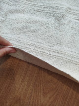 Alfombra beige de tela