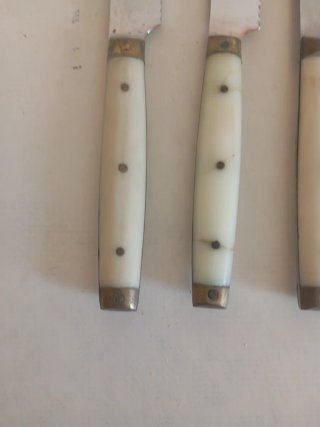 Juego de 12 cuchillos de mesa