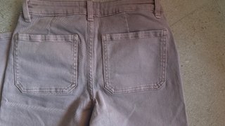 Pantalón Mango rosa con tachuelas